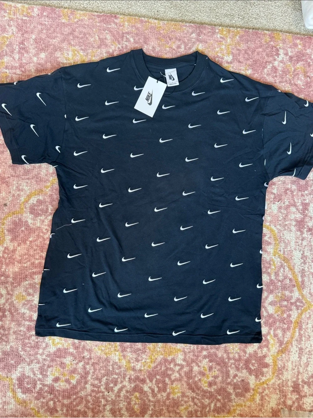 Nike Black Short-Sleeve Tee with Repeated White Swoosh
